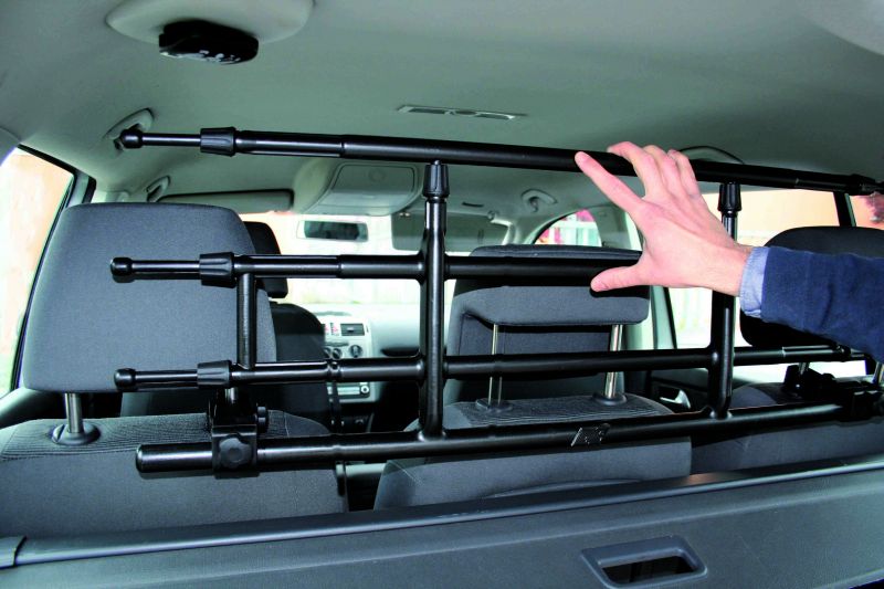 Griglia divisoria telescopica, applicazione al poggiatesta